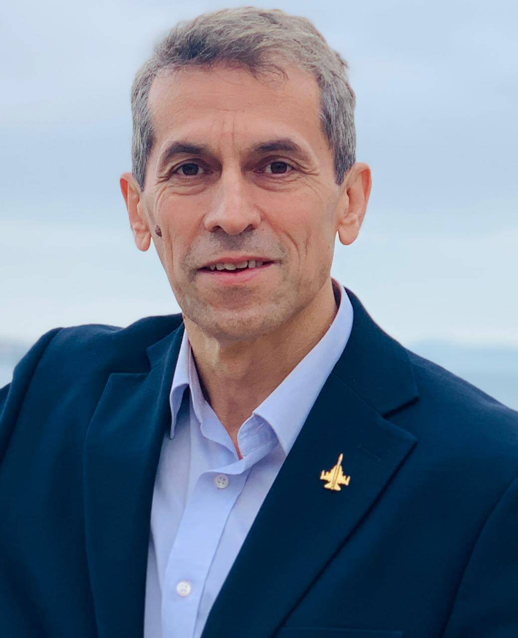 Professional headshot of Mutahir Islam